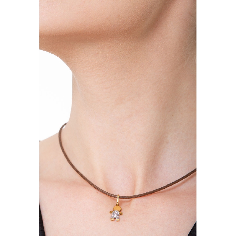 18k yellow gold child pendant with cubic zirconia