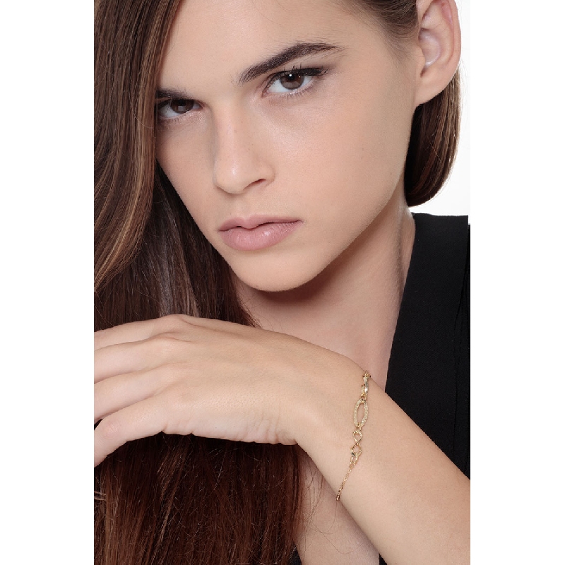 Bracelet with infinity symbols in 18k yellow gold