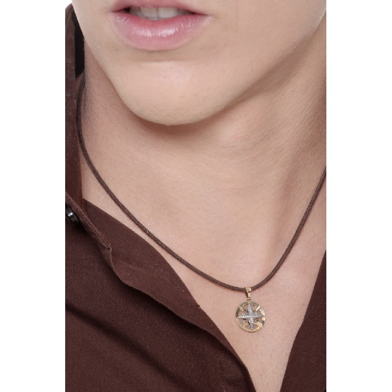 Ciondolo in oro bianco e giallo 18k con rosa dei venti.