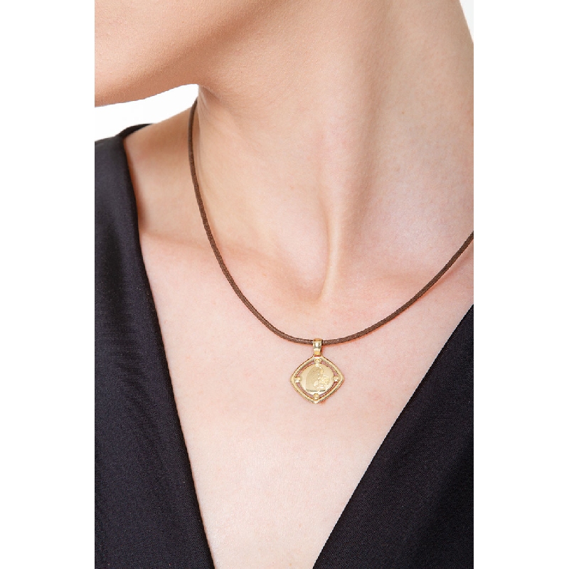 Medaglia sacra con Madonna e bimbo in oro giallo 18k.